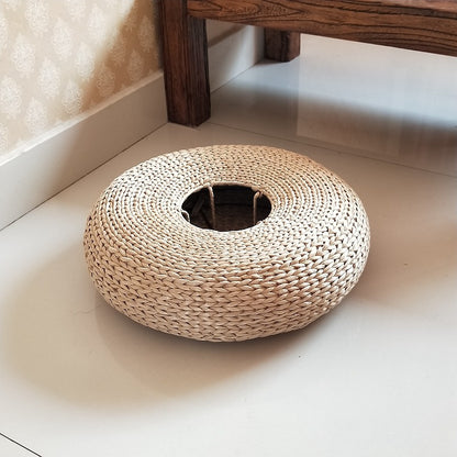 Handcrafted sitting pouf made of natural material Acalora