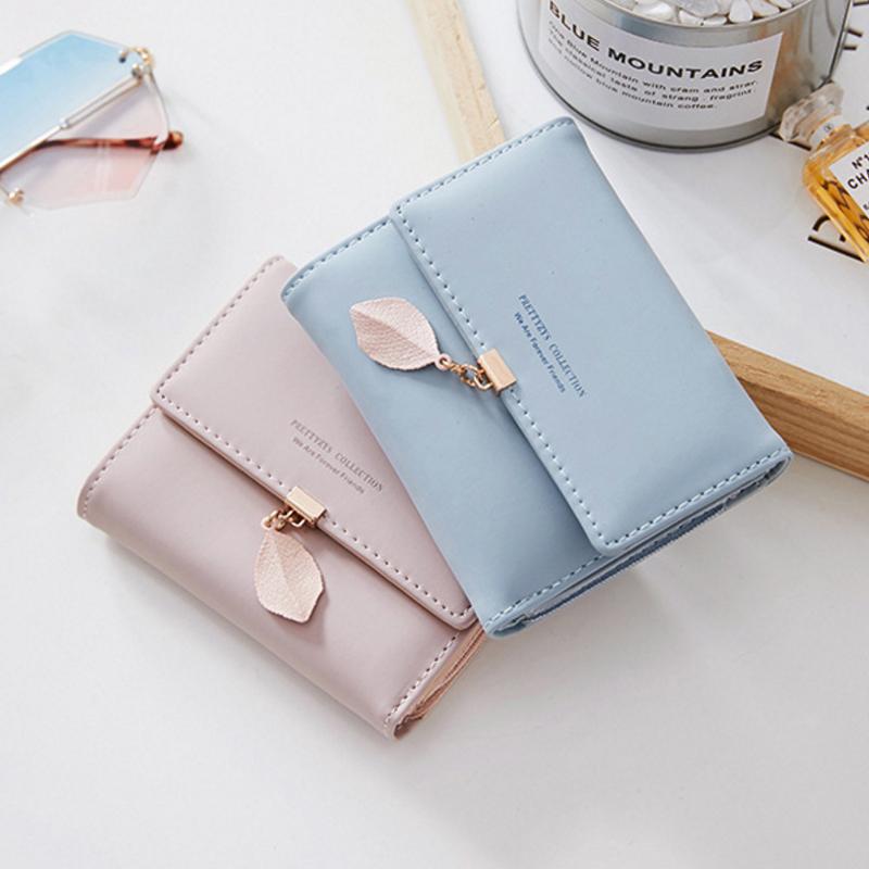 Short trifold wallet with leaf detail | Skanto