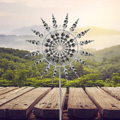 Silver-colored metal garden wind chime sculpture