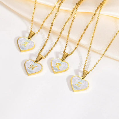 Skanto | 18k Pearl Heart Initial Necklace
