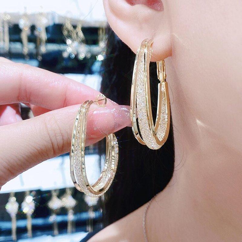 Skanto | Modern Cut Oval Earrings