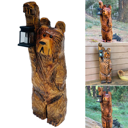 Cedar carved bear with solar lantern