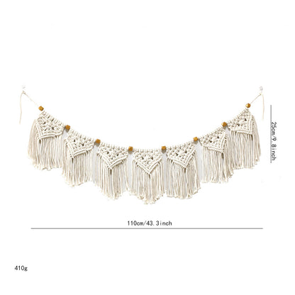 Decorative macrame wall hanging with ornate fringes