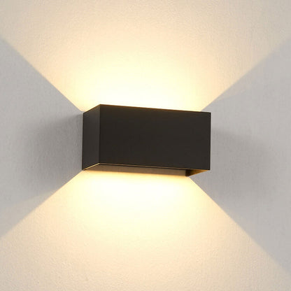 Modern, waterproof, rectangular outdoor LED wall light with up and down lighting.