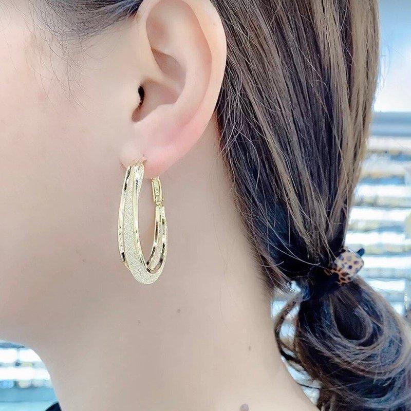 Skanto | Modern Cut Oval Earrings