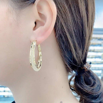 Skanto | Modern Cut Oval Earrings