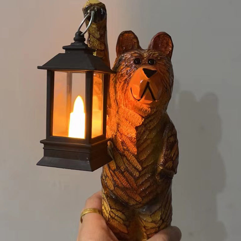 Cedar carved bear with solar lantern