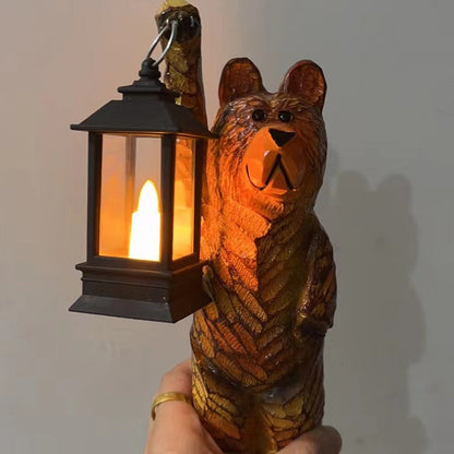 Cedar carved bear with solar lantern