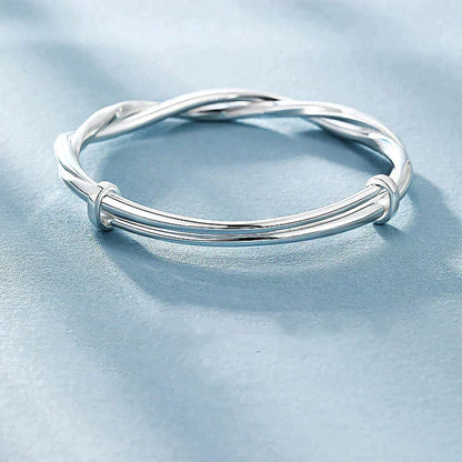 Elegant Twisted Silver Bracelet Bowlift
