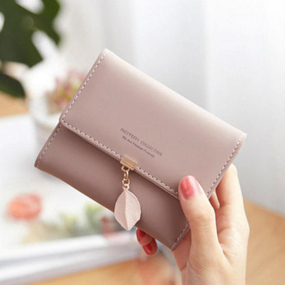 Short trifold wallet with leaf detail | Skanto