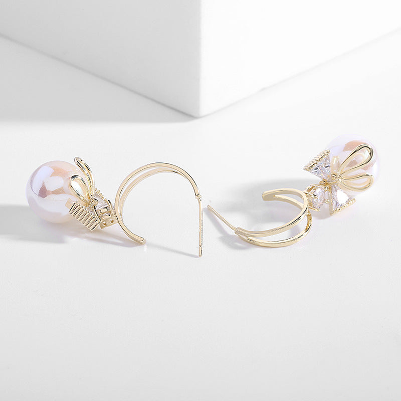 Skanto | Bow Pearl Earrings