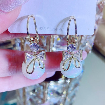 Skanto | Bow Pearl Earrings
