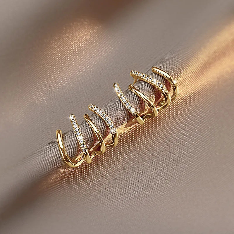 Skanto | Twisted Earrings | Elegant Design | Gold or Silver