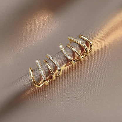 Skanto | Twisted Earrings | Elegant Design | Gold or Silver