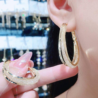 Skanto | Modern Cut Oval Earrings