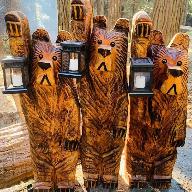 Cedar carved bear with solar lantern