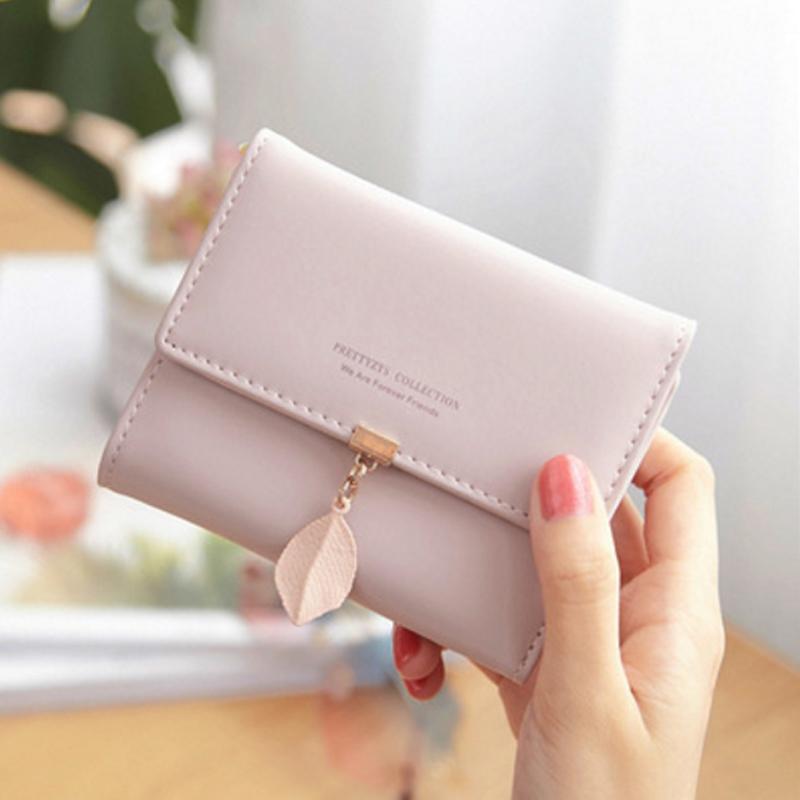 Short trifold wallet with leaf detail | Skanto