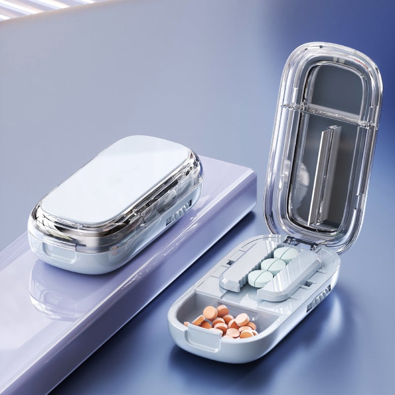 Portable pill cutter with adjustable compartments Karnz