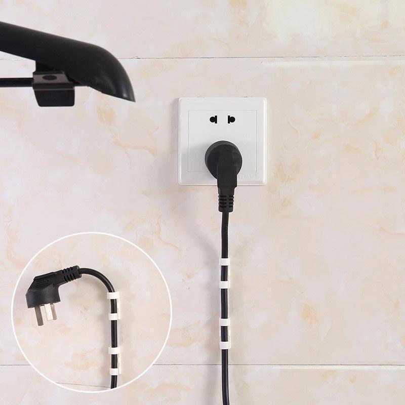 Self-adhesive plastic wire/cable clips | Karnz
