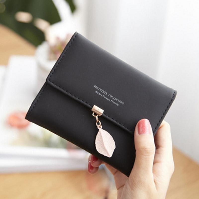 Short trifold wallet with leaf detail | Skanto