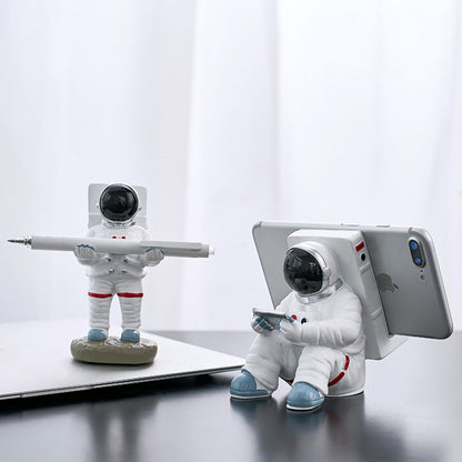 Support for phones or pens in astronaut decorations | Bowlift