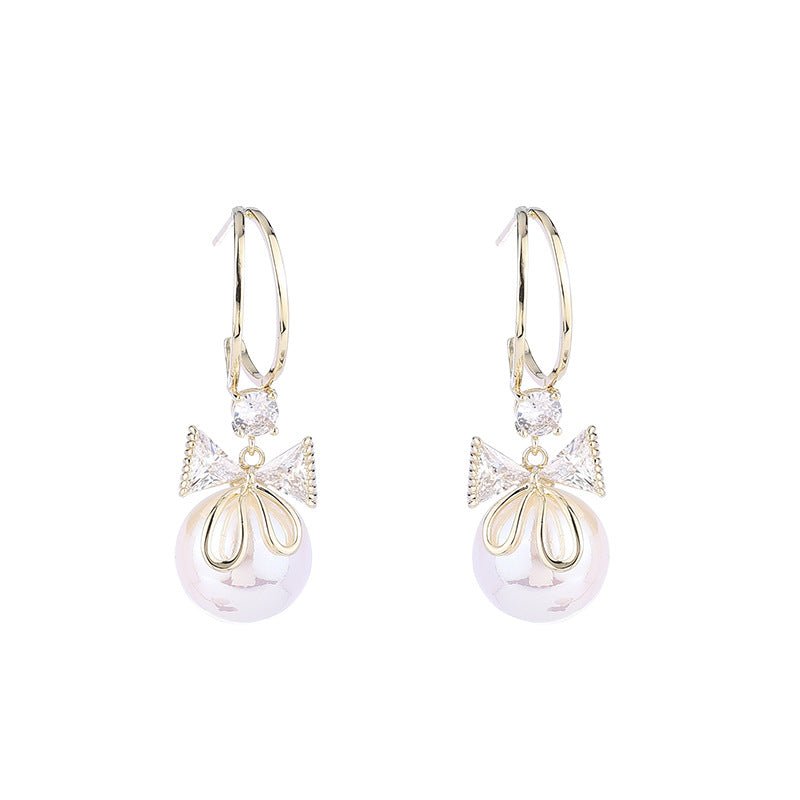 Skanto | Bow Pearl Earrings