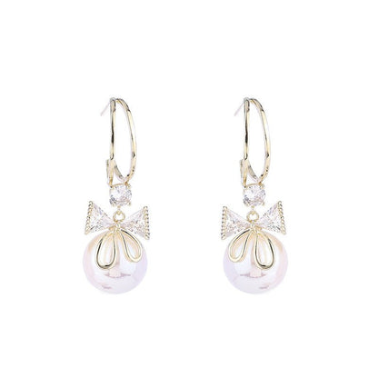 Skanto | Bow Pearl Earrings