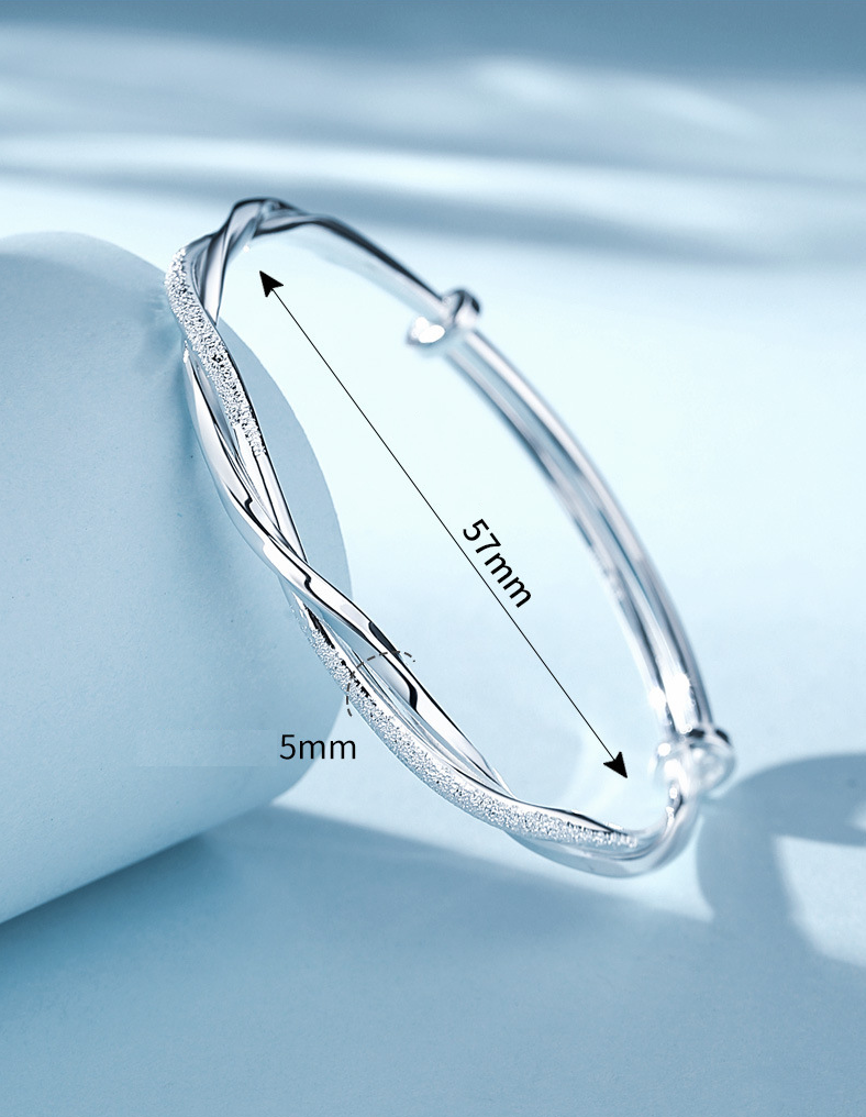 Elegant Twisted Silver Bracelet Bowlift