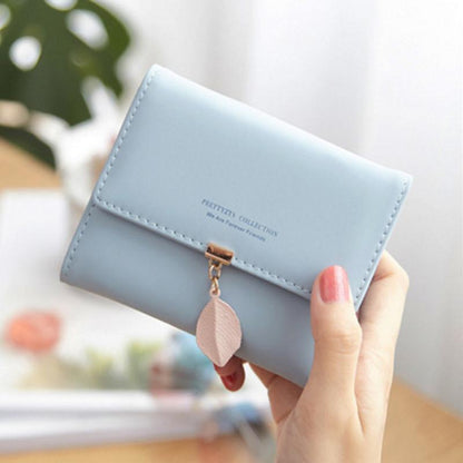 Short trifold wallet with leaf detail | Skanto