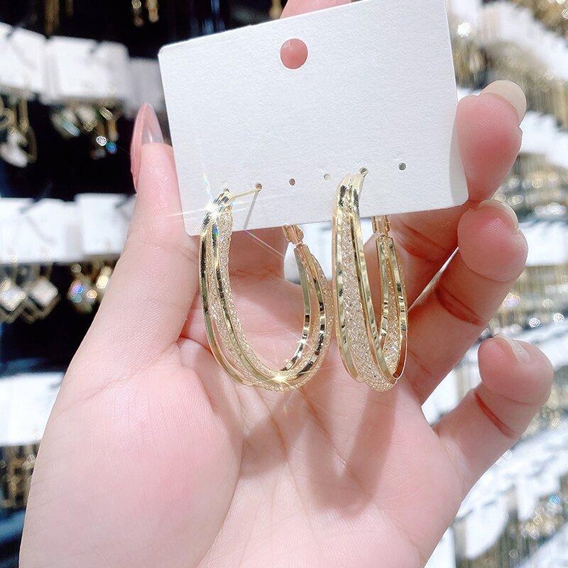 Skanto | Modern Cut Oval Earrings