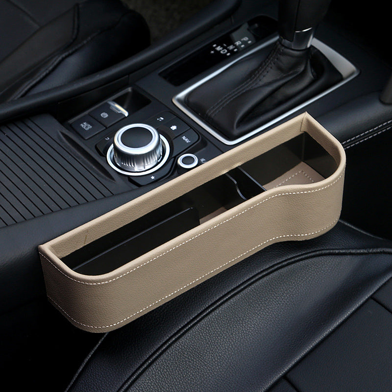 Multifunctional storage box for car seats