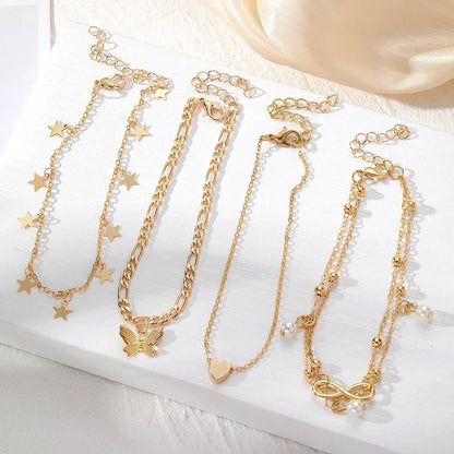 Skanto | 5pc Delicate Feminine Anklet Set (Stars, Heart, Butterfly, Infinity, Beads)