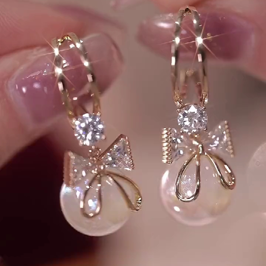 Skanto | Bow Pearl Earrings