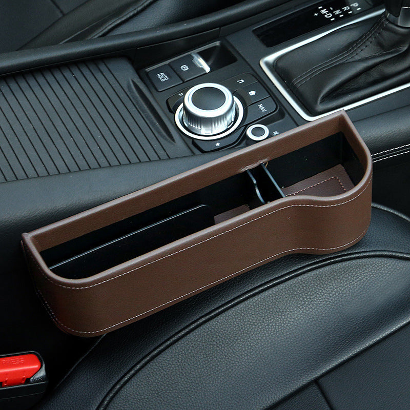 Multifunctional storage box for car seats
