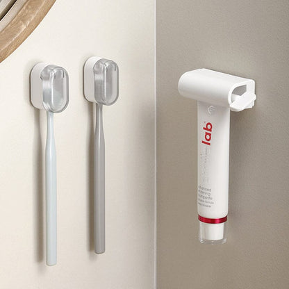 BowLift | Wall-mounted toothbrush holder with cover
