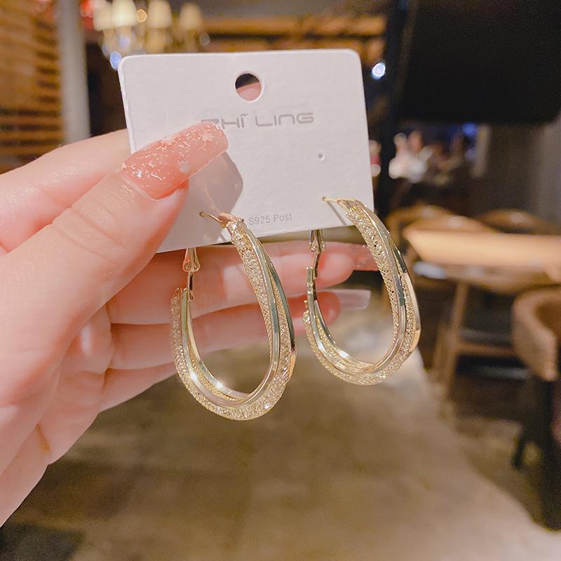Skanto | Modern Cut Oval Earrings