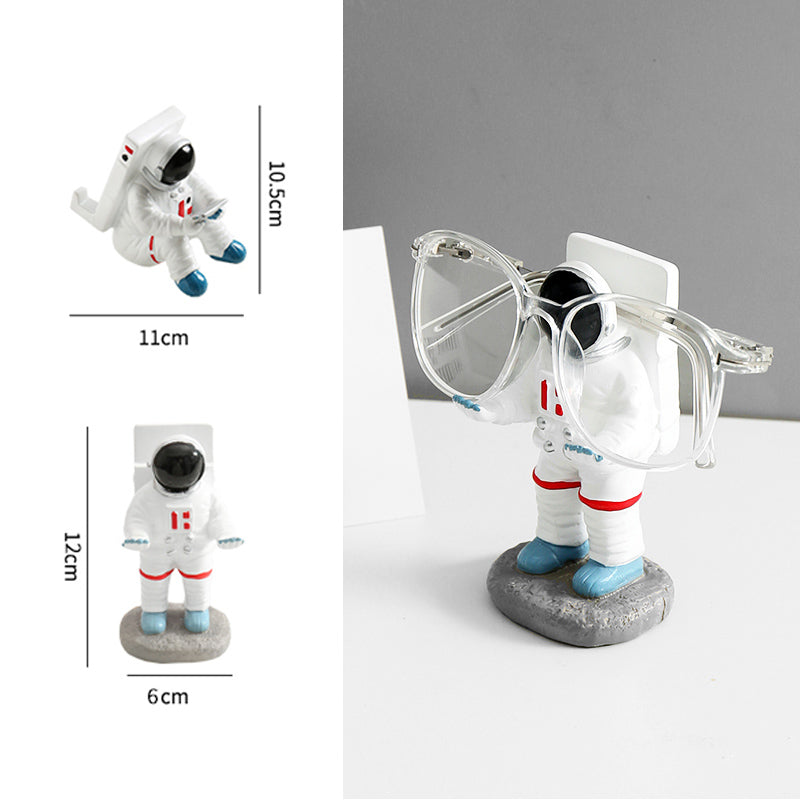 Support for phones or pens in astronaut decorations | Bowlift