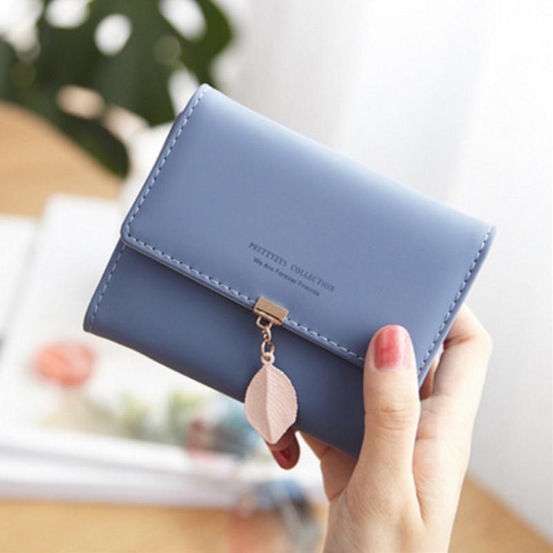 Short trifold wallet with leaf detail | Skanto