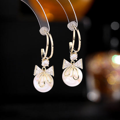 Skanto | Bow Pearl Earrings