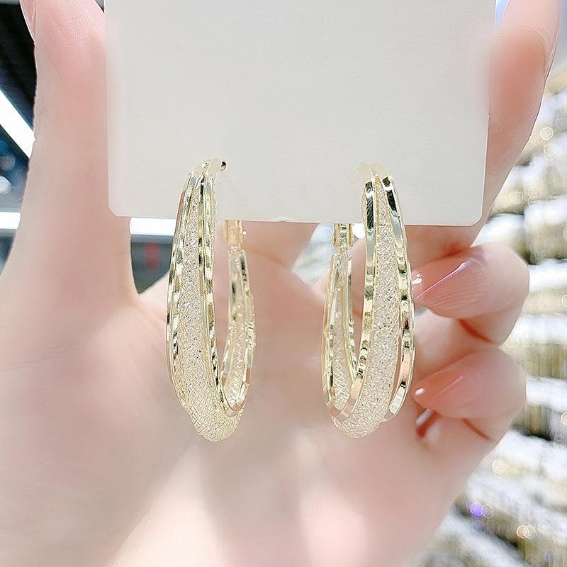 Skanto | Modern Cut Oval Earrings