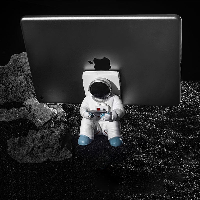 Support for phones or pens in astronaut decorations | Bowlift