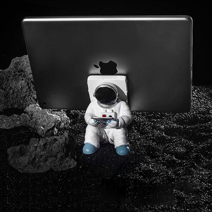Support for phones or pens in astronaut decorations | Bowlift