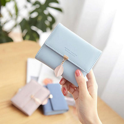 Short trifold wallet with leaf detail | Skanto