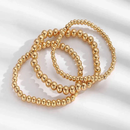 BowLift | 7pcs Gold Beaded Bracelet Stack