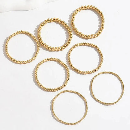 BowLift | 7pcs Gold Beaded Bracelet Stack