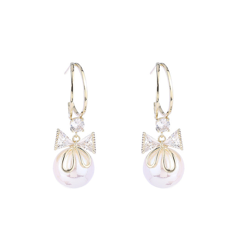 Skanto | Bow Pearl Earrings
