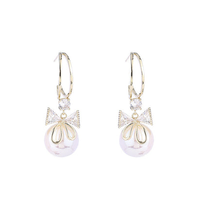 Skanto | Bow Pearl Earrings