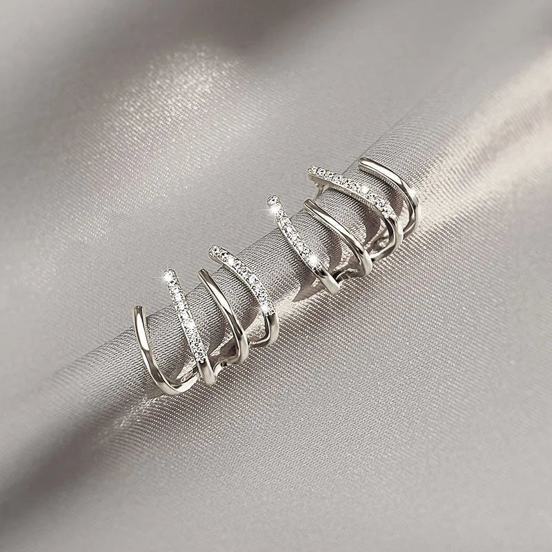 Skanto | Twisted Earrings | Elegant Design | Gold or Silver