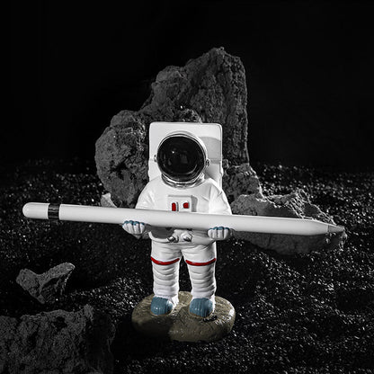 Support for phones or pens in astronaut decorations | Bowlift