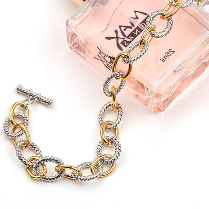 BowLift | Two Tone Knot Twisted Bangle